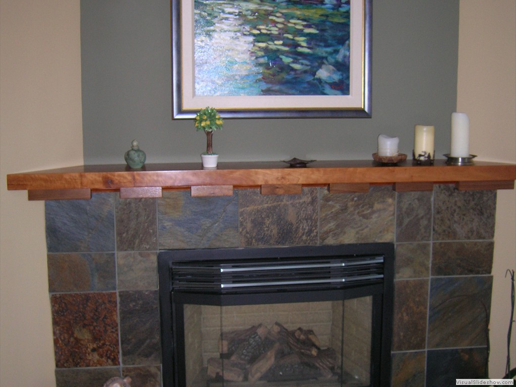 Living room fireplace with cherry mantle