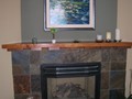 Living room fireplace with cherry mantle